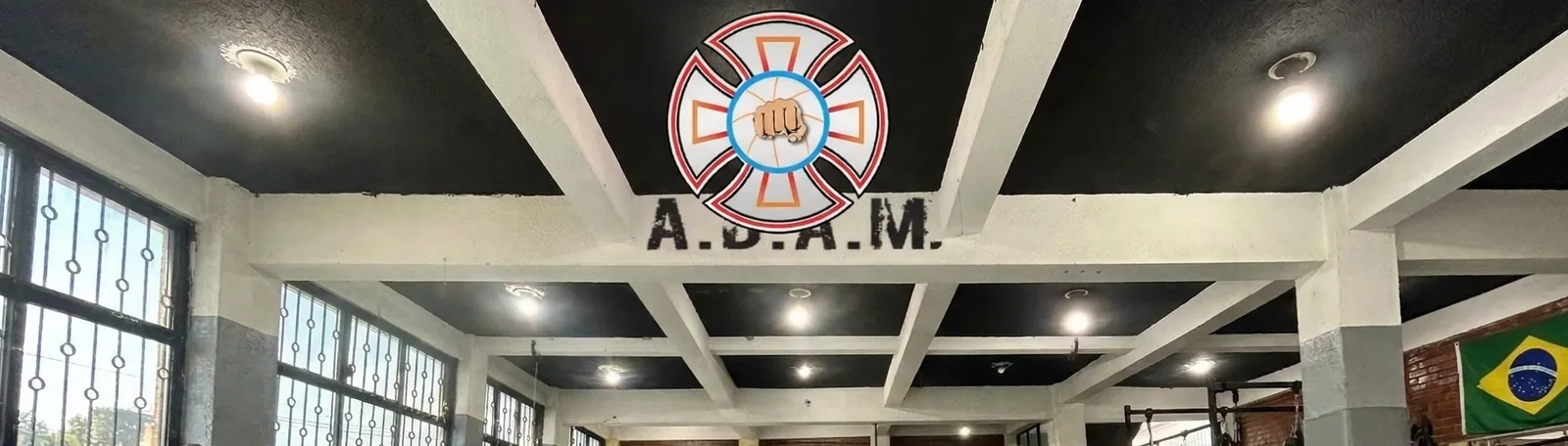 Academia Diosdado de Artes Marciales (ADAM) — its own site publishes address, contact, programmes and a priced trial class, and the federation registry carries the same street byte for byte
