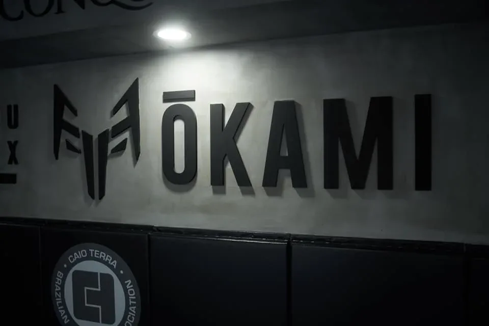 ŌKAMI Combat Sports — its own site, rebuilt since our last pass, now publishes address, a full weekly timetable, staff and lineage. Use the www host; the bare apex fails certificate validation